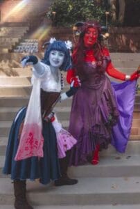 Marion Cosplay by Mari (@moonlit.mari) || Jester Cosplay by Jade (@caboodlenoodles)|| Wigs styled by Jade (@caboodlenoodles) || Photography by @honeyandheatherphoto